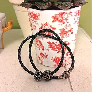 Pandora leather bracelet with two charms